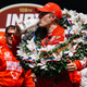 Chip Ganassi Racing driver Marcus Ericsson sips milk after winning the 2022 Indy 500